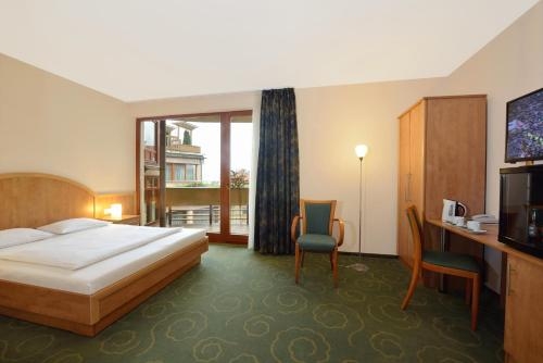 Imagen de la habitación del Hotel Semiramis Business. Foto 6