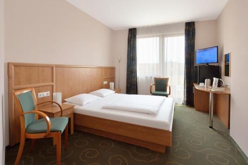 Imagen de la habitación del Hotel Semiramis Business. Foto 7