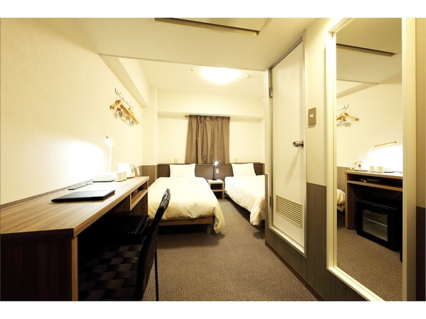 Imagen de la habitación del Hotel Sendai Business Ekimae. Foto 4