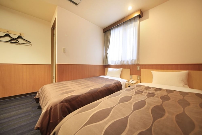 Imagen de la habitación del Hotel Sendai Business. Foto 12