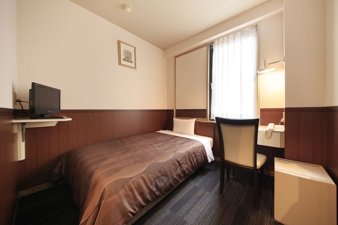 Imagen de la habitación del Hotel Sendai Business. Foto 16