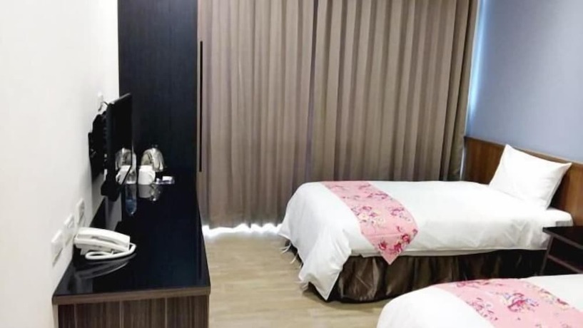 Imagen general del Hotel Sendale Zhubei Business Hotel. Foto 21