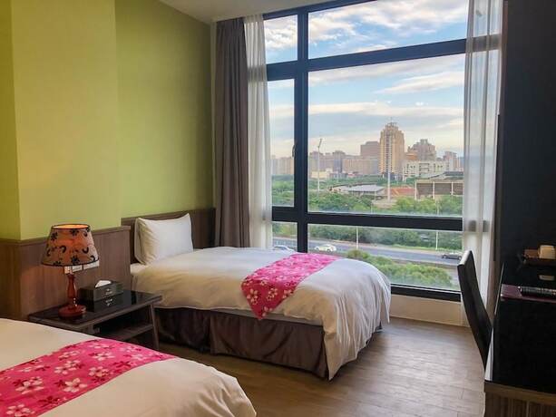 Imagen de la habitación del Hotel Sendale Zhubei Business Hotel. Foto 25