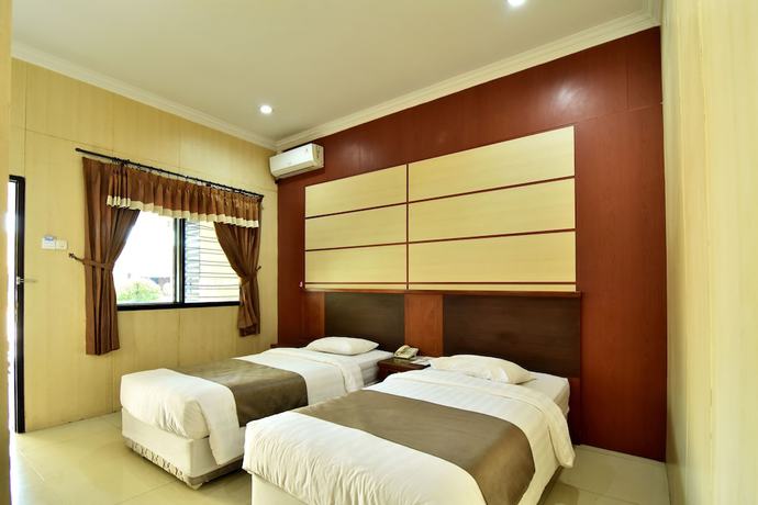 Imagen de la habitación del Hotel Sendang Sari. Foto 9