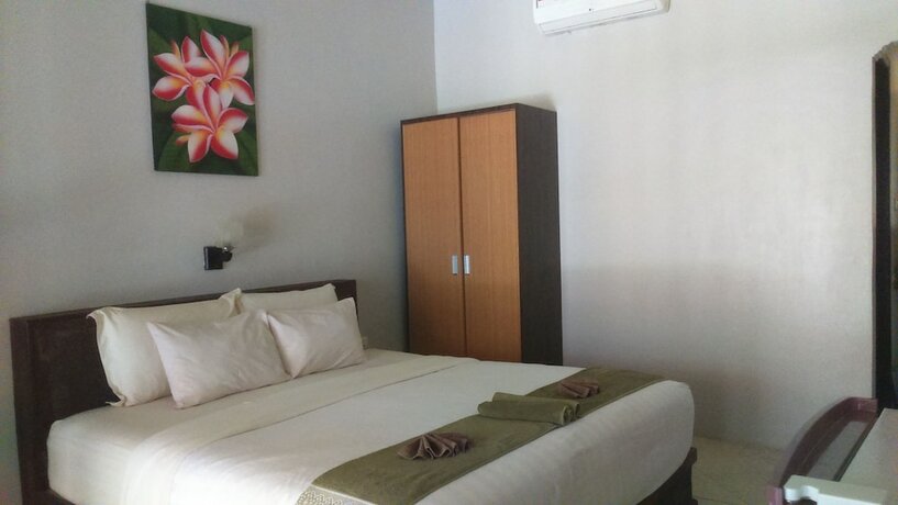 Imagen de la habitación del Hotel Senggigi Cottages Lombok. Foto 20