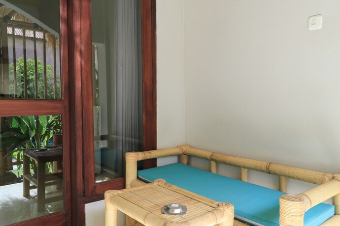 Imagen de la habitación del Hotel Senggigi Cottages Lombok. Foto 21