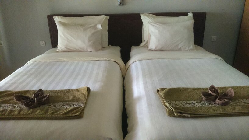 Imagen de la habitación del Hotel Senggigi Cottages Lombok. Foto 23