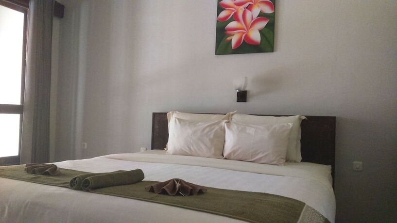 Imagen de la habitación del Hotel Senggigi Cottages Lombok. Foto 24