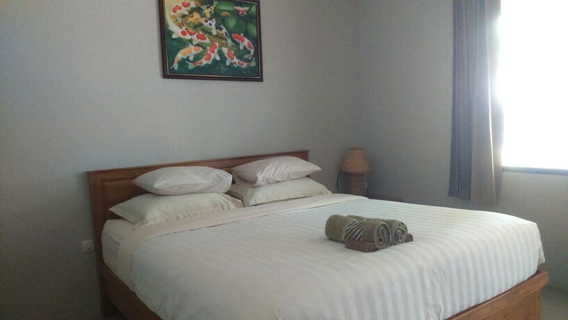 Imagen de la habitación del Hotel Senggigi Cottages Lombok. Foto 25