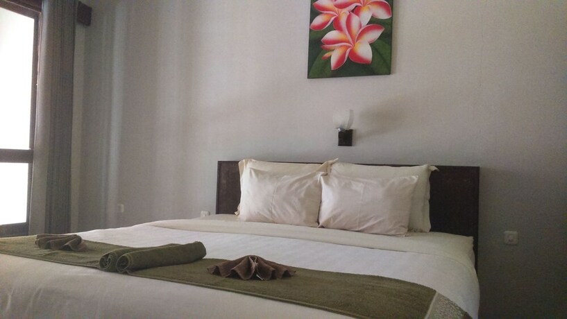 Imagen de la habitación del Hotel Senggigi Cottages Lombok. Foto 26