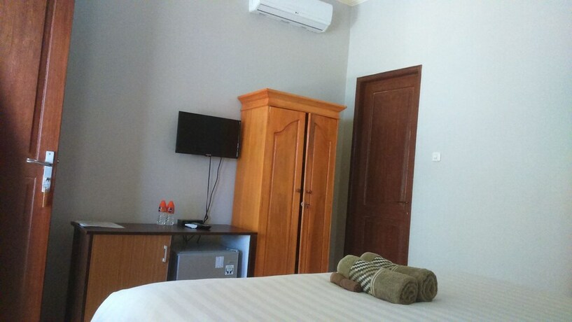 Imagen de la habitación del Hotel Senggigi Cottages Lombok. Foto 27