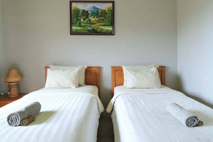 Imagen de la habitación del Hotel Senggigi Cottages Lombok. Foto 28