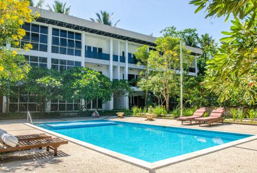 Imagen de la habitación del Hotel Senggigi Homes & Apartments &. Foto 19