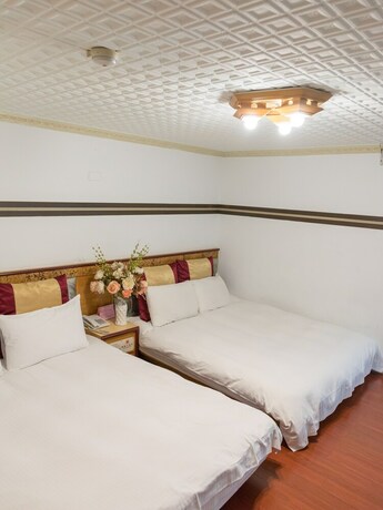Imagen de la habitación del Hotel Seng-kuo. Foto 18