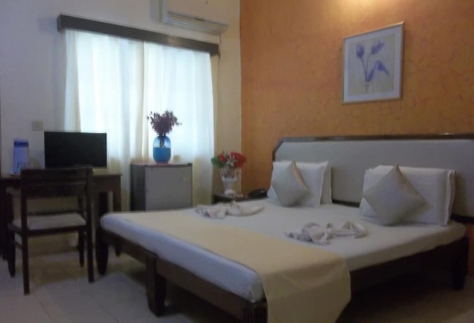Imagen de la habitación del Hotel Senhor Angelo Beach Resort. Foto 7