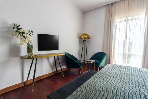 Imagen de la habitación del Hotel Senhora Da Rosa Tradition and Nature. Foto 4