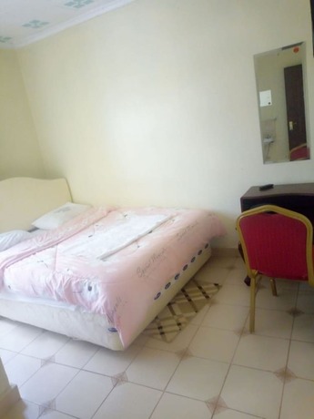 Imagen de la habitación del Hotel Senior Chief Wambugu Palace. Foto 15