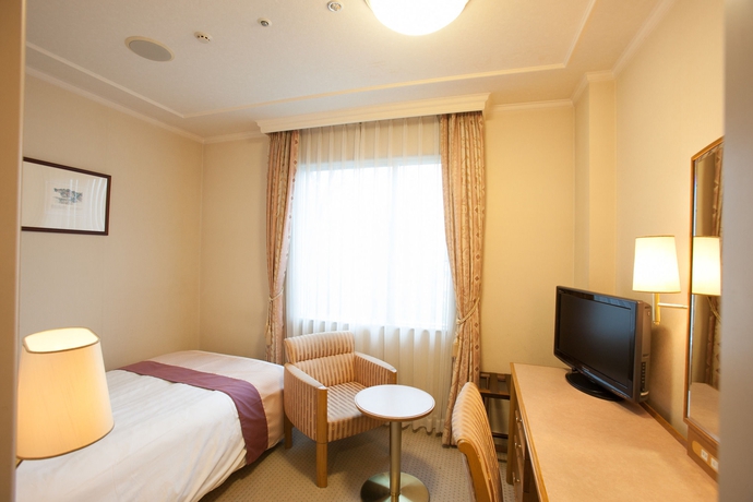 Imagen de la habitación del Hotel Senri Hankyu Osaka. Foto 8