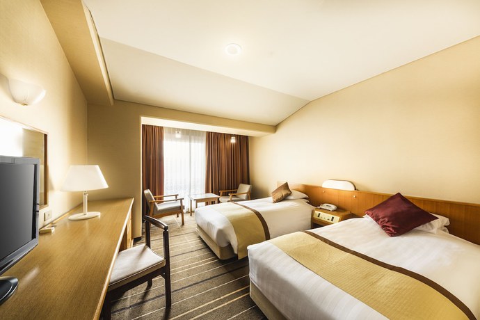 Imagen de la habitación del Hotel Senri Hankyu Osaka. Foto 11