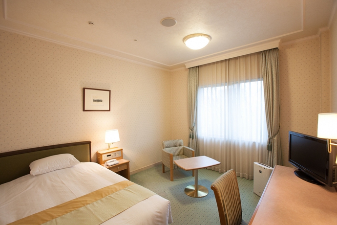 Imagen de la habitación del Hotel Senri Hankyu Osaka. Foto 13