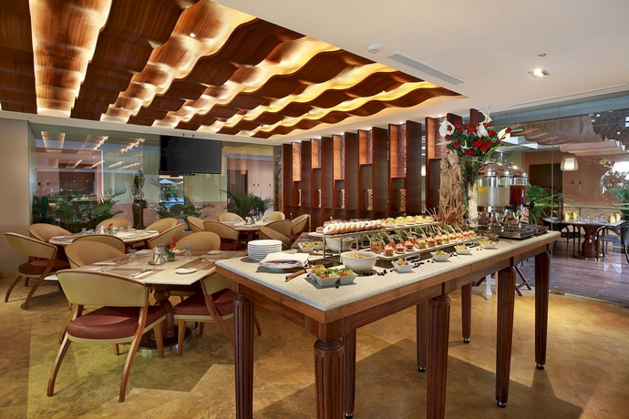 Imagen del bar/restaurante del Hotel Sens Hotel And Spa Conference Ubud Town Centre. Foto 6