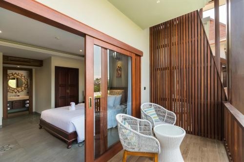 Imagen de la habitación del Hotel Sense Canggu Beach. Foto 9
