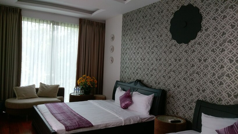 Imagen de la habitación del Hotel Sense Legend. Foto 7