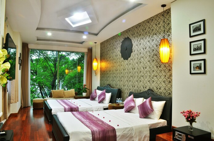 Imagen de la habitación del Hotel Sense Legend. Foto 19