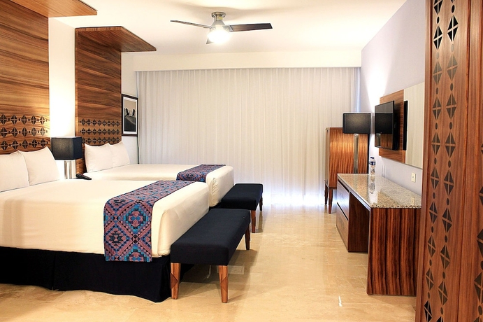 Imagen de la habitación del Hotel Sensira Resort & Spa Riviera Maya All Inclusive. Foto 9