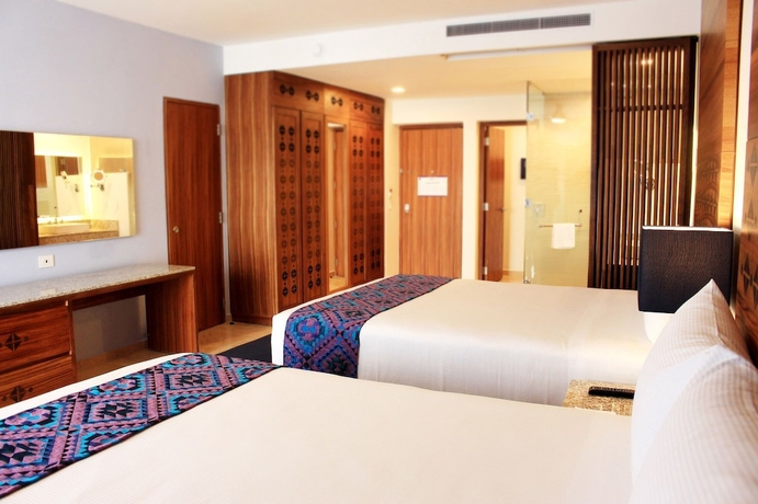 Imagen de la habitación del Hotel Sensira Resort & Spa Riviera Maya All Inclusive. Foto 10