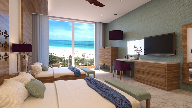 Imagen de la habitación del Hotel Sensira Resort & Spa Riviera Maya All Inclusive. Foto 11