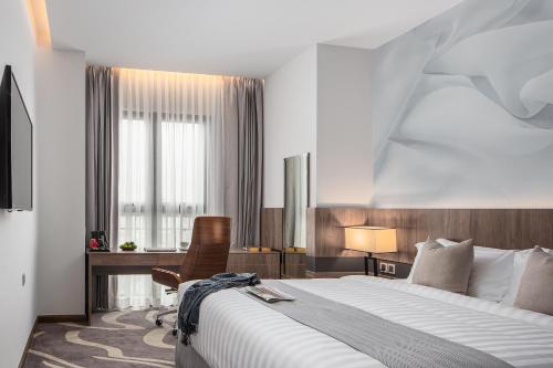 Imagen de la habitación del Hotel Sensory Park Urban. Foto 11