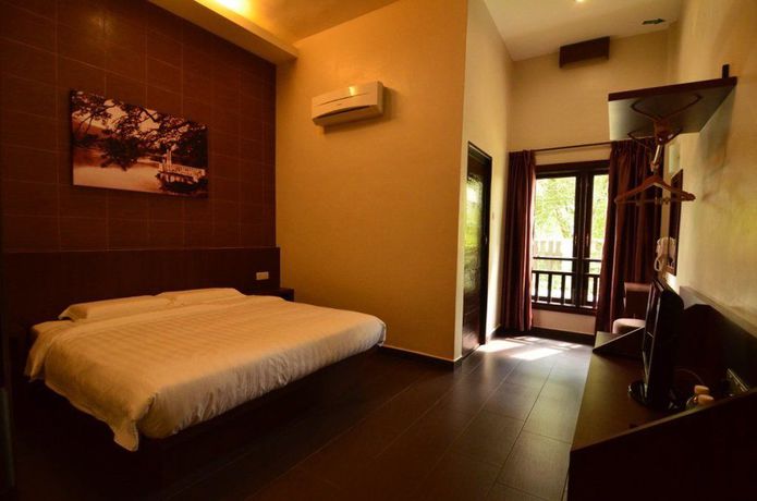 Imagen de la habitación del Hotel Sentosa Villa. Foto 5