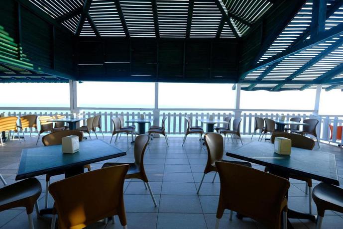 Imagen del bar/restaurante del Hotel Senza Garden Holiday Club. Foto 8