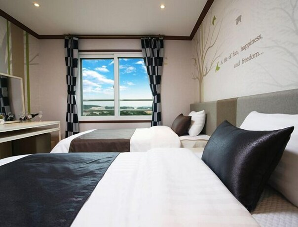 Imagen de la habitación del Hotel Seongsan Aqua Beach. Foto 14