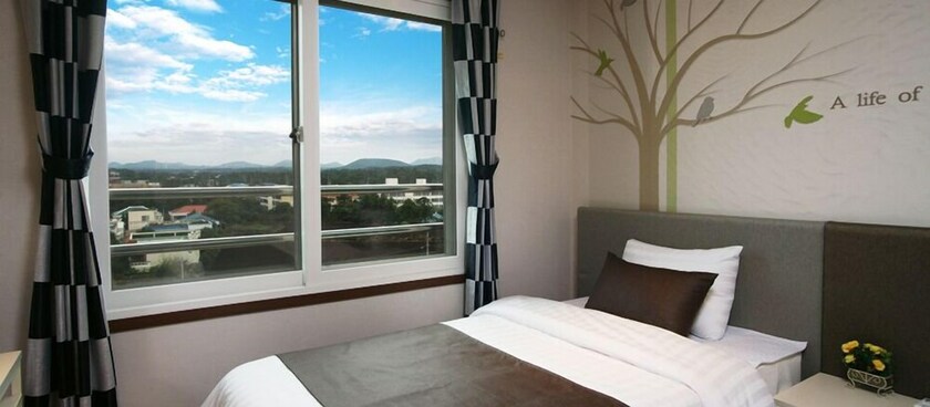 Imagen de la habitación del Hotel Seongsan Aqua Beach. Foto 15