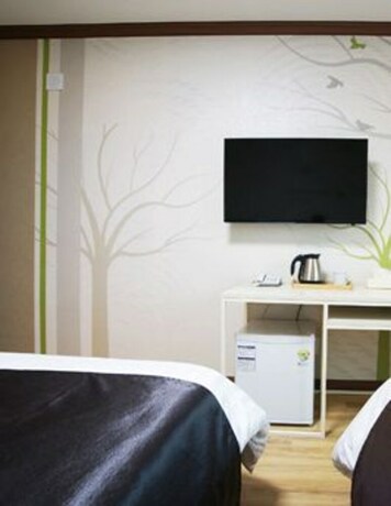 Imagen de la habitación del Hotel Seongsan Aqua Beach. Foto 19
