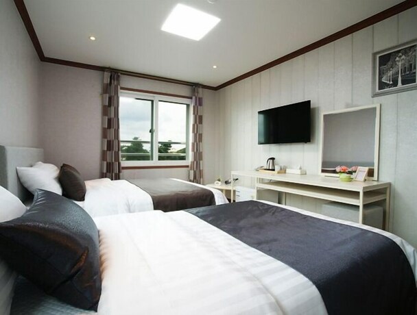 Imagen de la habitación del Hotel Seongsan Aqua Beach. Foto 20