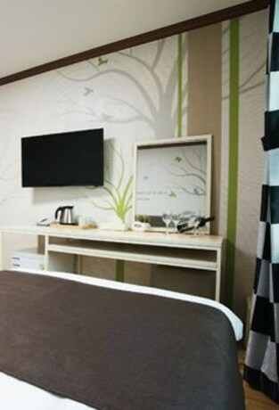 Imagen de la habitación del Hotel Seongsan Aqua Beach. Foto 31