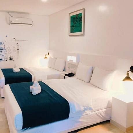 Imagen de la habitación del Hotel Seoul, Clark Freeport Zone. Foto 27