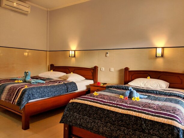 Imagen de la habitación del Hotel Serangan Inn Mimba. Foto 24