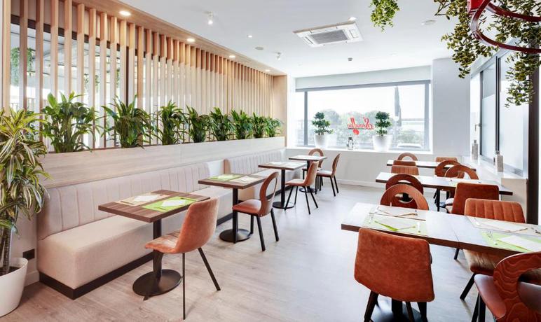 Imagen del bar/restaurante del Hotel Sercotel AB Rivas. Foto 2