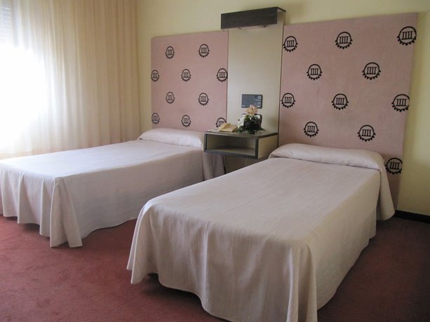 Imagen de la habitación del Hotel Sercotel Cuatro Postes. Foto 6