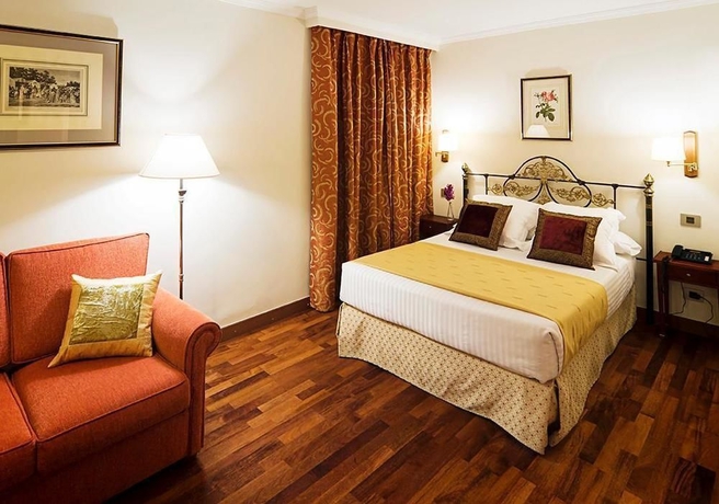 Imagen de la habitación del Hotel Sercotel Las Casas De Los Mercaderes. Foto 8