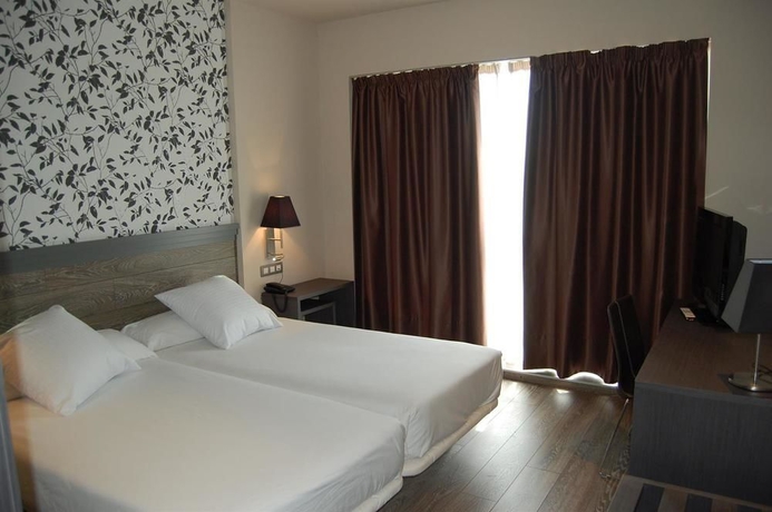 Imagen de la habitación del Hotel Sercotel Plaza Feria. Foto 5