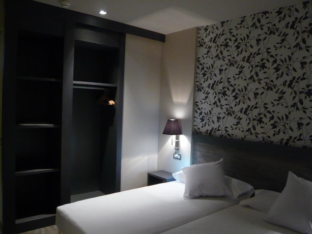Imagen de la habitación del Hotel Sercotel Plaza Feria. Foto 7