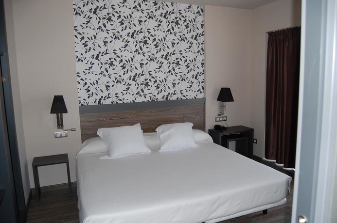 Imagen de la habitación del Hotel Sercotel Plaza Feria. Foto 8