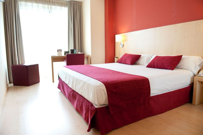 Imagen de la habitación del Hotel Sercotel Portales. Foto 8