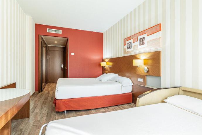 Imagen de la habitación del Hotel Sercotel las Artes Pinto. Foto 8