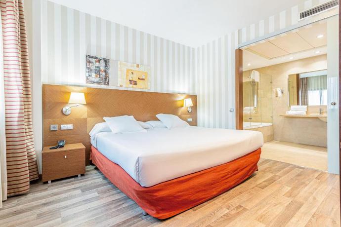 Imagen de la habitación del Hotel Sercotel las Artes Pinto. Foto 12